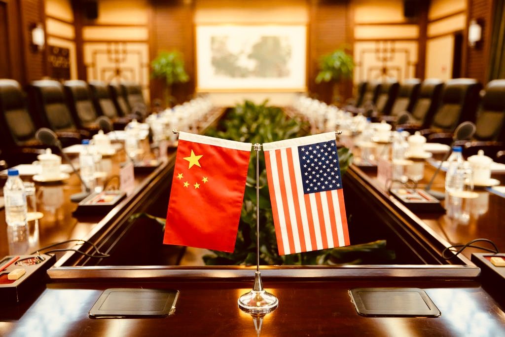 FILE PHOTO: Flags of U.S. and China are placed for a meeting between Secretary of Agriculture Sonny Perdue and China's Minister of Agriculture Han Changfu at the Ministry of Agriculture in Beijing, China June 30, 2017. REUTERS/Jason Lee/File Photo